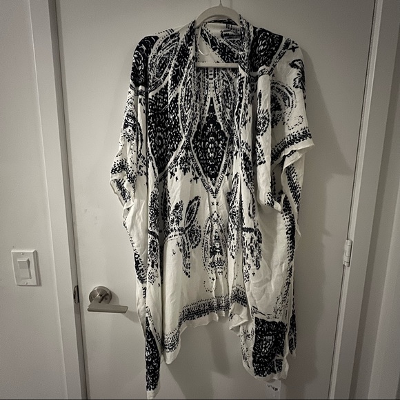 Cape one size fits all - Picture 3 of 8